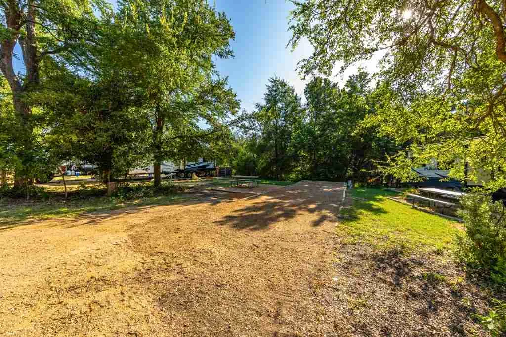 Tree-lined grounds at Cottonwood Creek RV Park